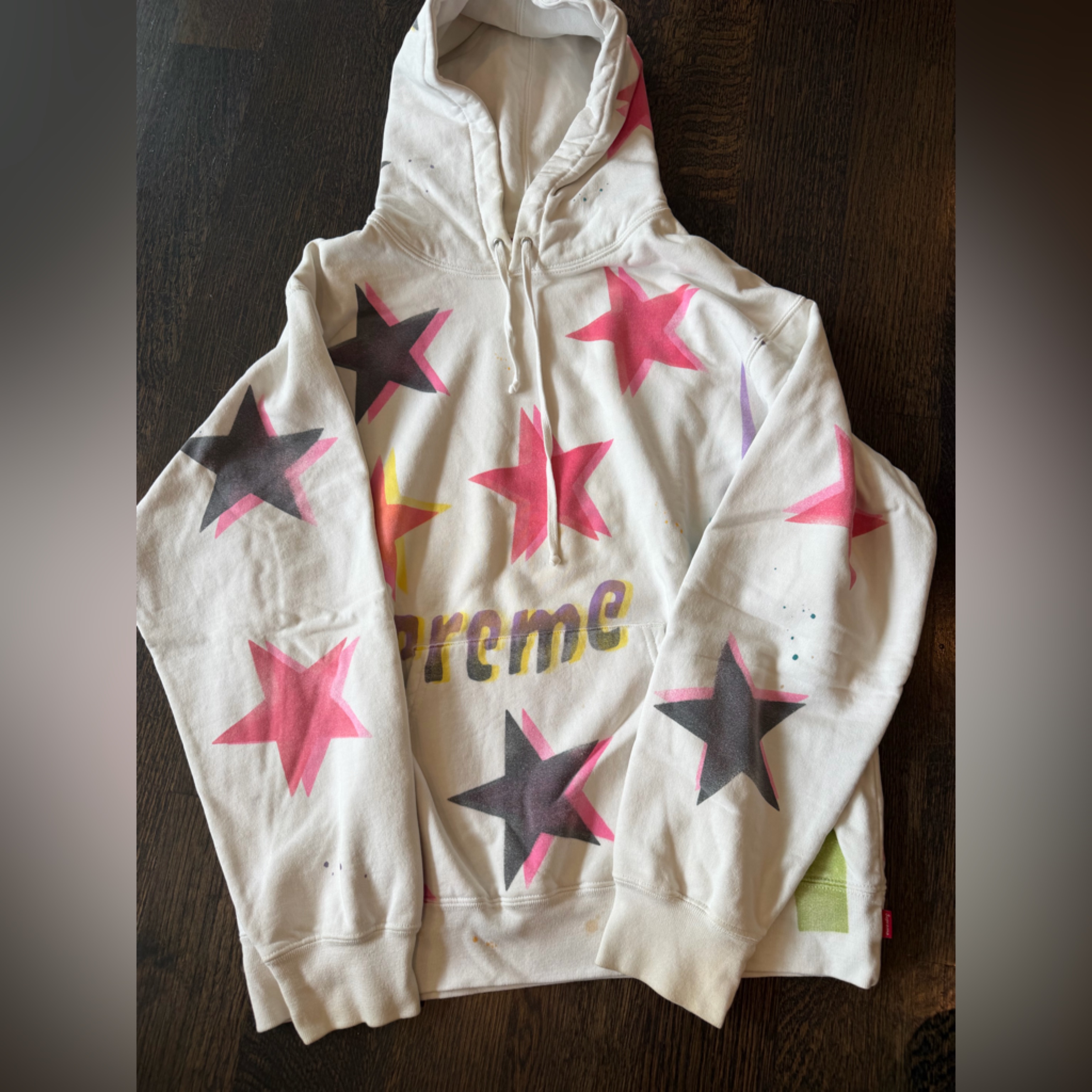 Supreme Cream Hoodie With Pink Accent And Green Tag